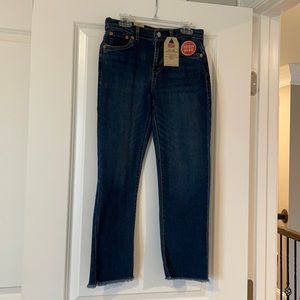 Girls Levi’s jeans with frayed angle